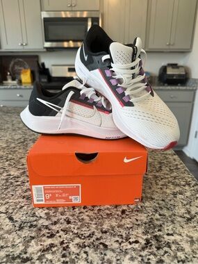 Nike White Running Shoes with Black & Pink Details